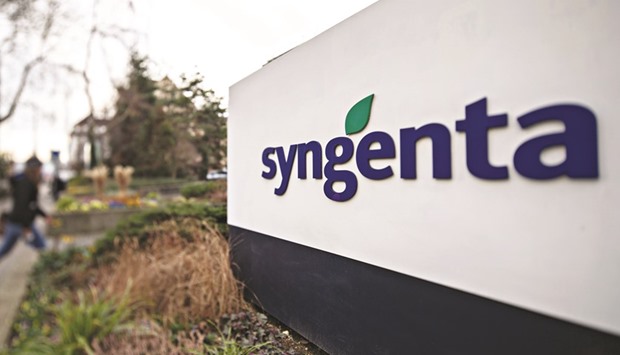 A company logo is seen on a sign outside Syngentau2019s headquarters in Basel. ChemChina and Syngenta announced that the companies have received clearance on their proposed transaction from the Committee on Foreign Investment in the United States, a joint statement released by Syngenta said yesterday.