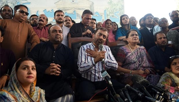 Muttahida Qaumi Movement (MQM) leader Farooq Sattar gestures as he addresses a press conference in Karachi on Tuesday.