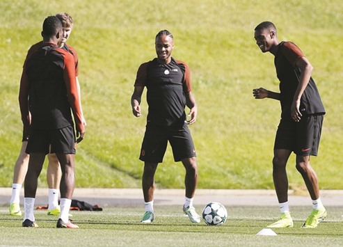 Manchester Cityu2019s Raheem Sterling (centre) along with teammates during a training session ahead of their Champions League clash against Steaua Bucharest.