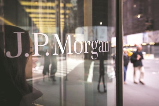 JPMorgan Chase & Co signage is displayed at its Madison Avenue building in New York. The inclusion in the indices could help sukuk break away from their traditional buy-and-hold investor base.
