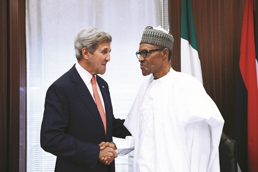 Buhari welcoming Kerry upon the latteru2019s arrival at the Presidential Villa in Abuja.