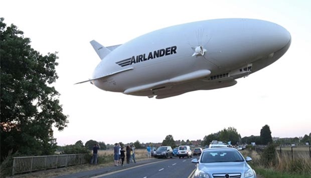 The Airlander 10 hybrid airship is pictured on its maiden flight from Cardington Airfield near Bedford, north of London, on August 17.