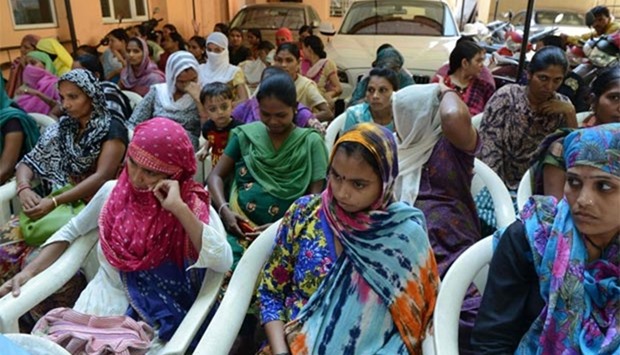 Indian surrogate mothers are seen during a protest in Anand, some 90 kms from Ahmedabad, in this file picture. The Indian government has approved plans to ban the booming commercial surrogacy industry.