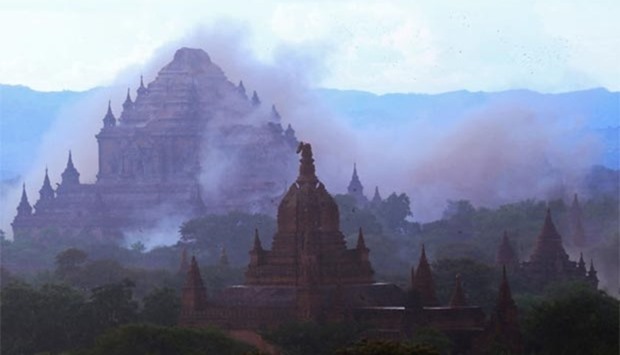 The ancient Sulamuni temple is seen shrouded in dust as a 6.8 magnitude earthquake hit Bagan on Wednesday.
