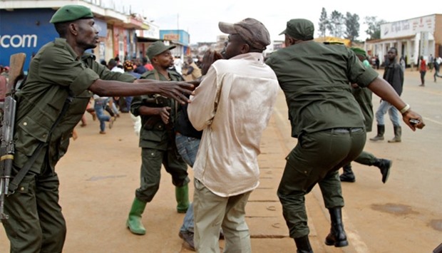Congolese soldiers arrest civilians protesting against the government's failure to stop the killings and inter-ethnic tensions in the town of Butembo, North Kivu province in Democratic Republic of Congo.