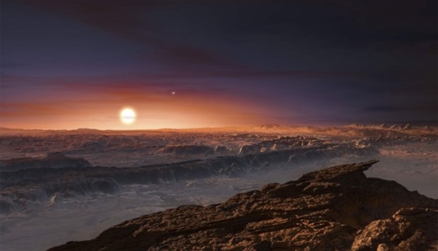 A view of the surface of the planet Proxima b orbiting the red dwarf star Proxima Centauri, the closest star to our Solar System, is seen in an impression released by the European Southern Observatory