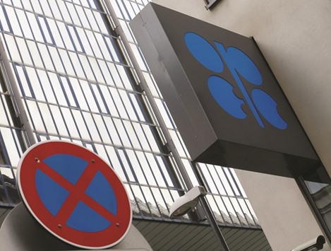 The logo of the Organisation of the Petroleum Exporting Countries is pictured behind a traffic sign at its headquarters in Vienna, Austria. u201cA production freeze would likely prove self-defeating if it succeeded in supporting oil prices further, with the US oil rig count up 28% since May,u201d Goldman said.