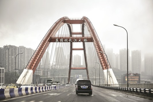 Vehicles drive across Caiyuanba bridge in Chongqing, China. Saudi Arabia shipped an average of 1.05mn bpd to China in the year through July 31, giving it a market share of 14%.