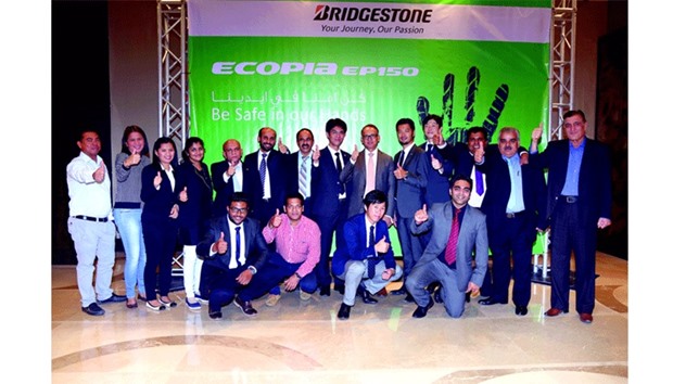 Aamal Trading and Distribution and Bridgestone Middle East & Africa officials during the launching of Bridgestoneu2019s Ecopia EP150 in Qatar.