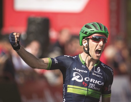 Orica-Bikeexchangeu2019s British cyclist Simon Yates celebrates winning the sixth stage of Tour of Spain in Luintra, Spain, yesterday. (AFP)