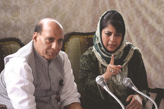 Jammu and Kashmir Chief Minister Mehbooba Mufti and federal Home Minister Rajnath Singh addresses a joint press conference in Srinagar.