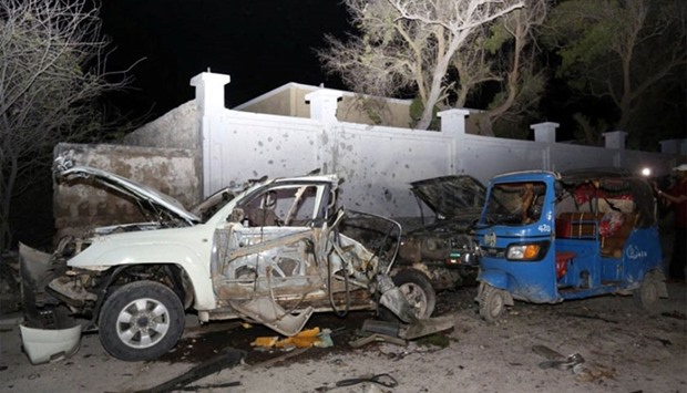 A general view shows the wreckage of vehicles destroyed in a car bomb explosion at the Banadir beach restaurant at Lido beach in Somalia's capital Mogadishu. Reuters