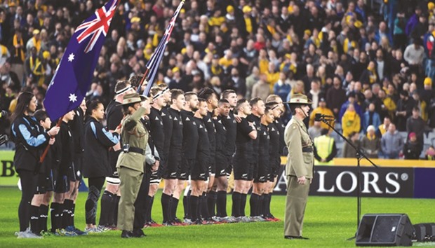 File photo of New Zealand players singing their national anthem prior to their Bledisloe Cup Rugby Championship match against Australia in Sydney on August 20.