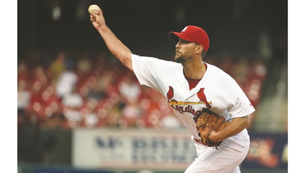 St. Louis Cardinals starting pitcher Adam Wainwright pitches to a New York Mets batter during the first inning of their game at Busch Stadium in St. Louis, Missouri, on Thursday. (USA TODAY Sports)