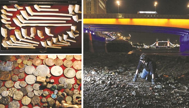 Pipes dating from 1580 to 1900 and Tudor coins which have been excavated from the River Thames by mudlark Jason Sandy are displayed at his home in London.  A mudlark uses a torch to look for objects under London Bridge on the bank of the River Thames.