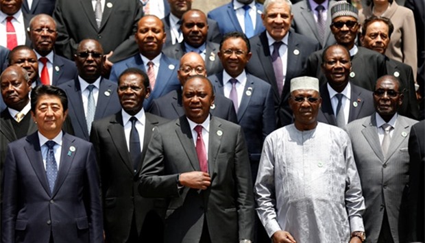 Japan's Prime Minister Shinzo Abe (L) with African leaders