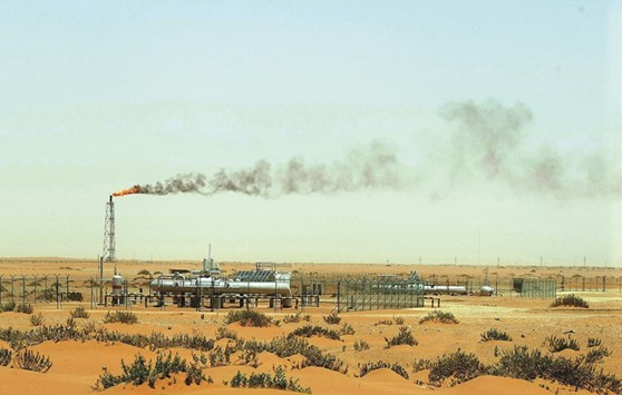 A picture taken on June 23, 2008 shows a flame from a Saudi Aramco oil facility in the desert near the oil-rich area of Khouris, 160km east of the Saudi capital Riyadh. Saudi Arabia hopes to list the company, also known as Saudi Aramco, in early 2018, Energy Minister Khalid al-Falih said in Los Angeles on Thursday.