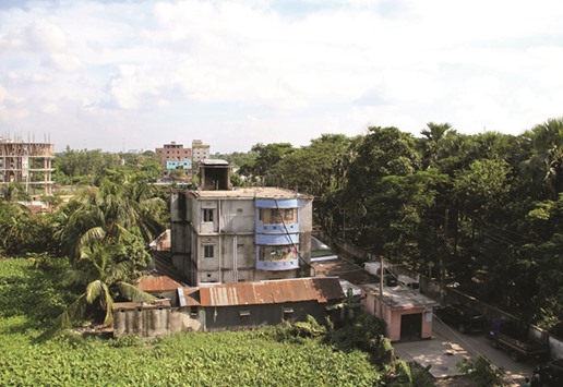 A building that was stormed by Bangladesh security personnel during an operation on a militant hideout is seen in Narayanganj.
