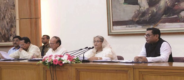 Prime Minister Sheikh Hasina addresses a press conference in Dhaka yesterday, justifying the construction of a coal-based power plant near the Sundarbans.