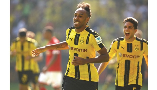 Borussia Dortmundu2019s Pierre-Emerick Aubameyang celebrates after scoring a goal against FSV Mainz yesterday.
