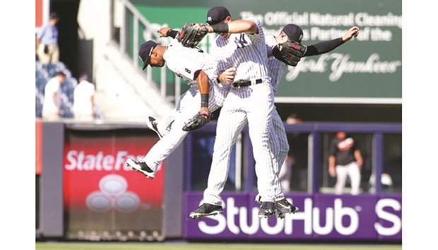 New York Yankees players celebrate after defeating the Baltimore Orioles 13-5. (Andy Marlin-USA TODAY Sports)