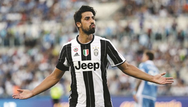 Juventusu2019 Sami Khedira celebrates after scoring against Lazio during their Italian Serie A match at the Olympic Stadium in Rome, Italy.