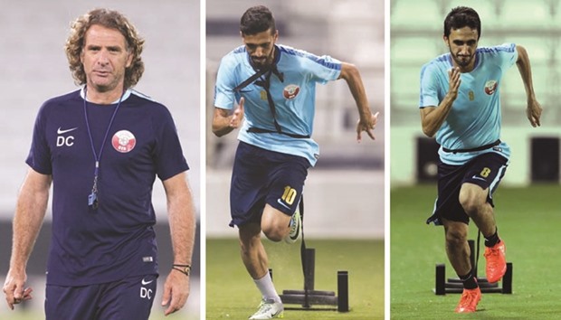 File picture of Qatar coach Jose Daniel Carreno during a training session.  Qatar players Hassan al-Haydous (middle) and Ali Asadallah (right) during a practice session.