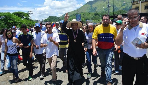 A walk through by citizens in the town of Villa de Cura in Central Venezuela to the capital to demand a referendum to oust President Nicol?s Maduro.
