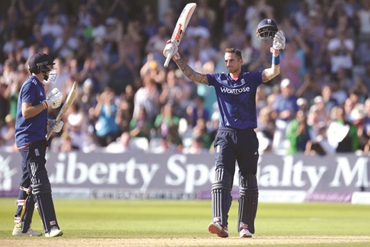 England batsman Alex Hales (R) celebrates scoring 150 runs during the third ODI against Pakistan at Trent Bridge ground in Nottingham.