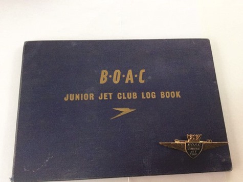 BOAC Junior Jet Club logbook with the Speedbird logo and JJC badge in the foreground.