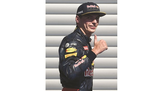 Second placed Red Bull Racingu2019s Belgian-Dutch driver Max Verstappen celebrates after the qualifying session at the Spa-Francorchamps circuit in Spa on August 27, 2016 ahead of the Belgian Formula One Grand Prix. (AFP)