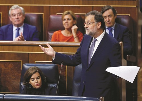Spainu2019s acting Prime Minister Mariano Rajoy reacts during an investiture debate at parliament in Madrid yesterday.