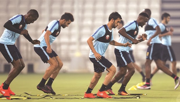 Qatar players during a training session ahead of their 2018 World Cup third round qualifying campaign.