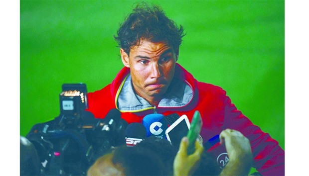 Spainu2019s Rafael Nadal answers journalistsu2019 questions after a tennis training session at the Olympic Tennis Centre in Rio de Janeiro.