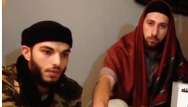 Adel Kermiche (L) and Abdel-Malik Nabil Petitjean, the killers of the priest, in an earlier video released on July 28, 2016.