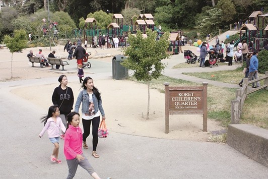 Children have plenty of options at the Koret Childrenu2019s Playground in San Franciscou2019s Golden Gate Park, including swings, climbing ropes, elaborate play structure and a couple of concrete paths down which kids can slide while sitting on cardboard.