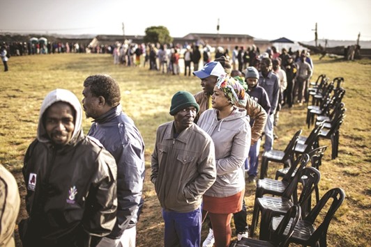 South African voters queuing at a polling station outside the hostels in Umlazi, Durban yesterday.