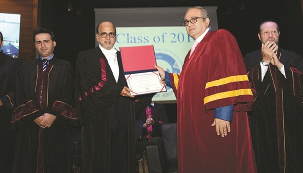 Seetharaman receives the honorary Doctor of Philosophy from AUL president Dr Adnan Hamzeh.