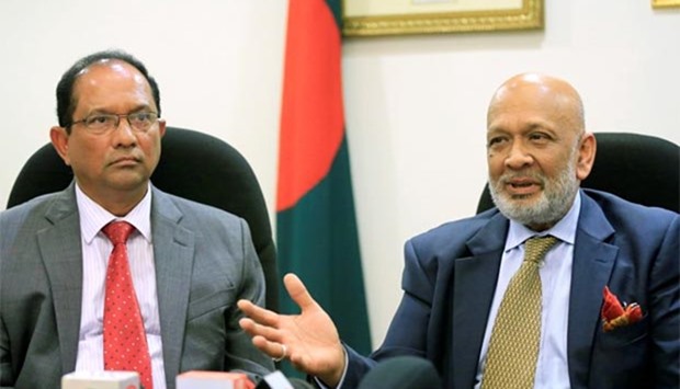 Bangladesh Bank lawyer Ajmalul Hossain (right) gestures with John Gomes, Bangladesh's ambassador to the Philippines, during a press conference at Bangladesh embassy in Manila on Friday.
