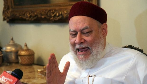 Former Egyptian mufti Ali Gomaa speaks to reporters at his home in Cairo's October 6 suburb on Friday following a shooting that targeted him at the Fadil mosque.