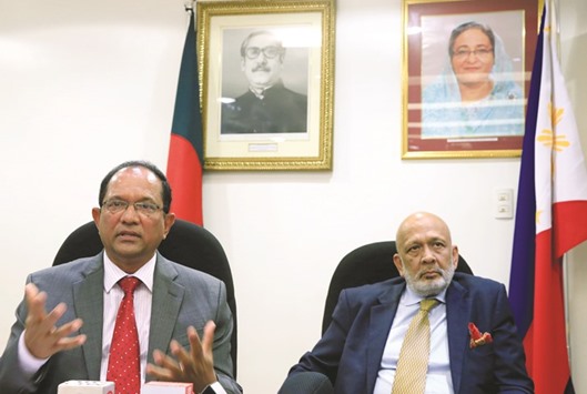 John Gomes (Left) Bangladesh ambassador to the Philippines, with bank lawyer Ajmalul Hossain during a press conference inside the Bangladesh embassy in Makati City, Metro Manila.