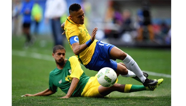Brazilu2019s Neymar vies for the ball with South Africau2019s Lebo Mothiba during the Rio 2016 Olympic Games first round Group A match at the Mane Garrincha Stadium in Brasilia on Thursday. (AFP)