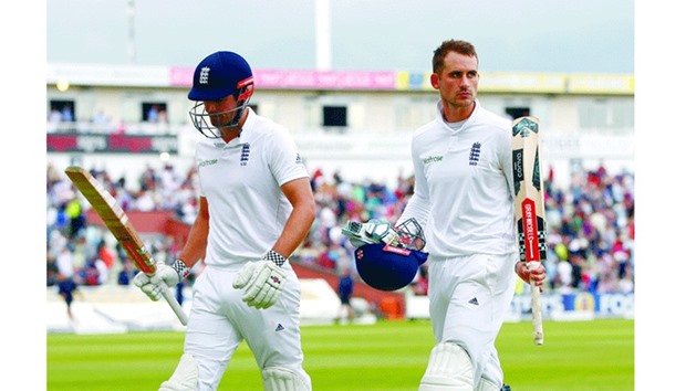 England openers Alex Hales (right) and Alastair Cook walk back after the end of the third dayu2019s play of the third Test at Edgbaston yesterday. (Reuters)