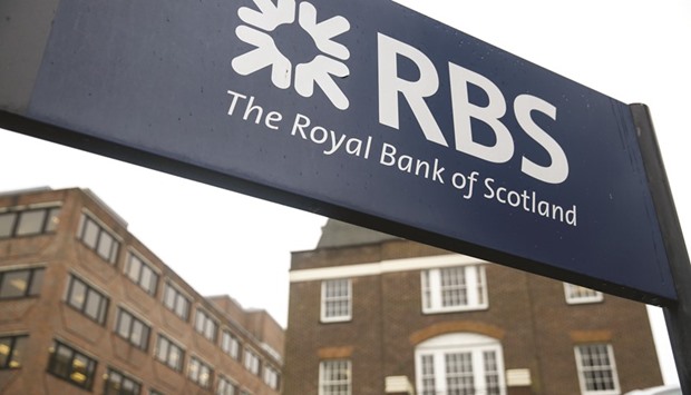 A sign is seen outside a Royal Bank of Scotland Group office in Brighton, UK. RBS Group on Friday became the latest to say theyu2019ll probably need more time to reach the return on equity goals, blaming the impact of lower-for-longer interest rates and depressed customer activity after the UKu2019s vote to leave the European Union.