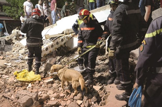 Search and rescue team keep going on to find the people after a building collapsed in Casablanca on Friday.