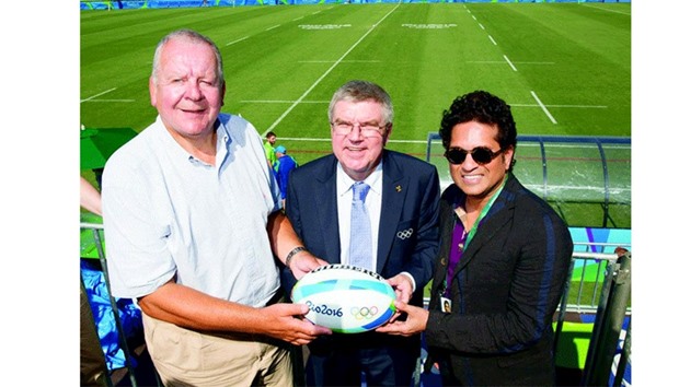 Indian cricket icon Sachin Tendulkar (right) enjoyed the Rio Games rugby competition on Saturday in the company of International Olympic Committee President Thomas Bach (centre).