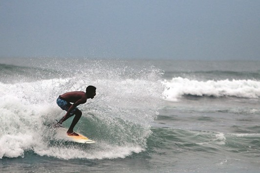 Seventeen-year-old Luis Rey Hernandez practices off the shore of the Mexican resort of Acapulco, Guerrero State.