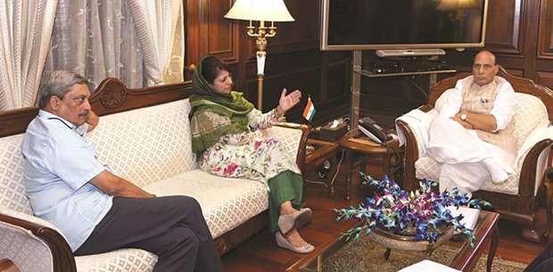 Jammu and Kashmir Chief Minister Mehbooba Mufti meets federal Home Minister Rajnath Singh and Defence Minister Manohar Parrikar in New Delhi yesterday.