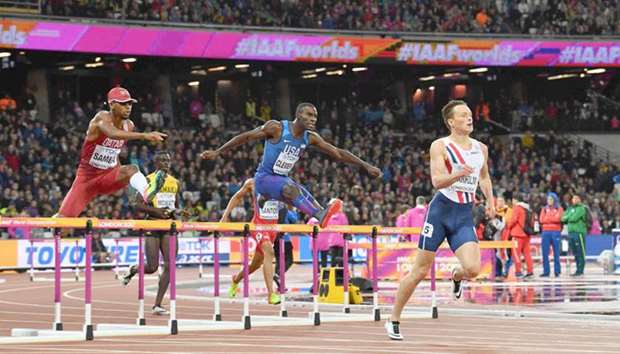 (From left) Qataru2019s Abderrahaman Samba, US athlete Kerron Clement and Norwayu2019s Karsten Warholm compete in the menu2019s 400m hurdles final at the 2017 IAAF World Championships in London yesterday. Warholm won the event. (AFP)