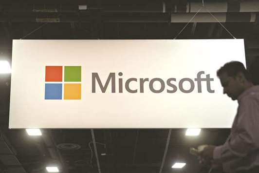 A signage is displayed in the exhibition hall during the Microsoft Inspire partner conference in Washington, DC, on July 10. As part of an agreement, Microsoft will give antivirus partners greater visibility into when new versions of Windows will be released and let them use their own alerts and notifications to tell customers to renew products, the company said in a blog post.